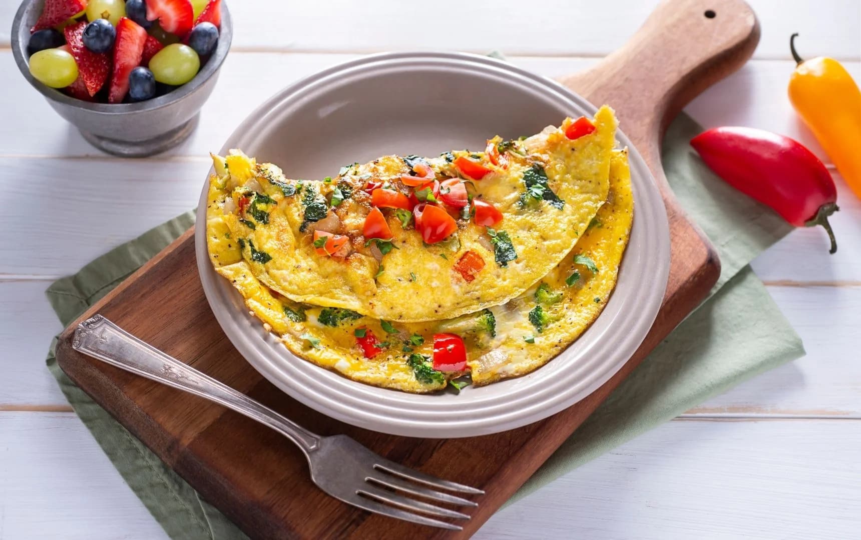 Healthy vegetable omelet served on a white plate