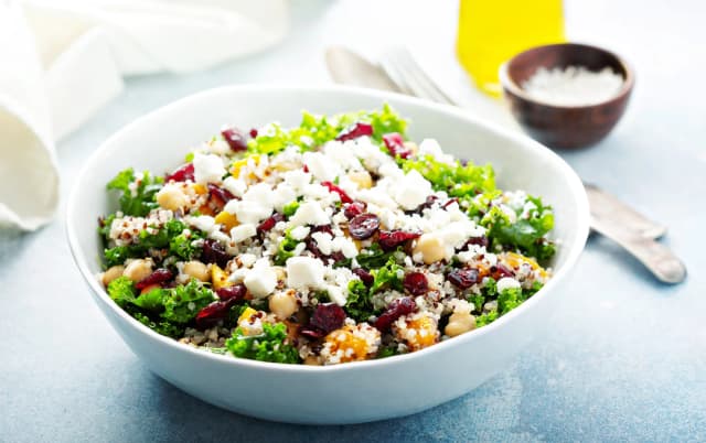 top view of a healthy breakfast Quinoa and Chickpea Salad served in the white bowl for Weight Loss